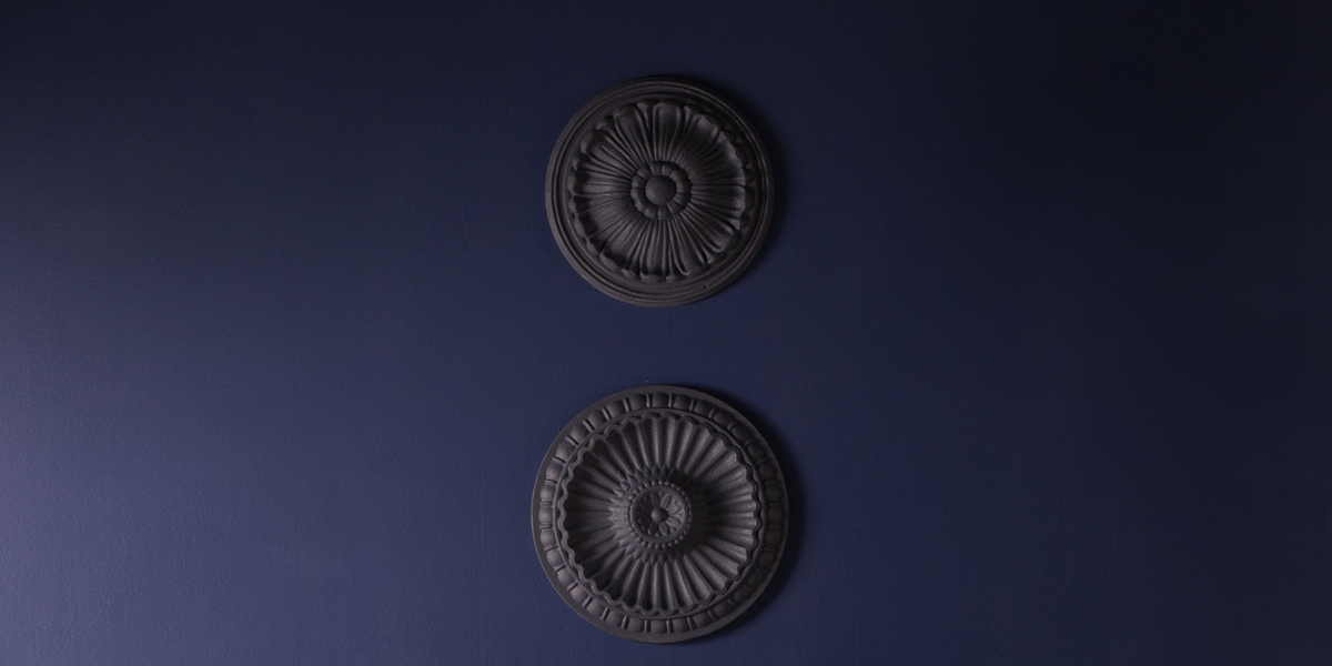 decorated-wall-in-dark-blue