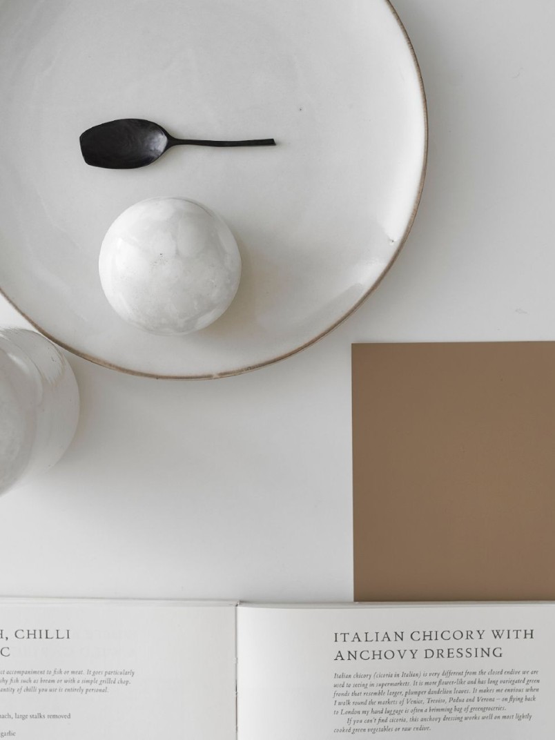 Riikka Kantinkoski painted the wall chocolate brown