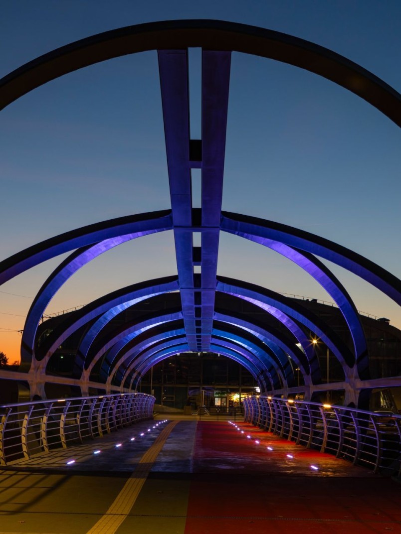 Smart and colourful pedestrian bridge attracts attention with its futuristic form