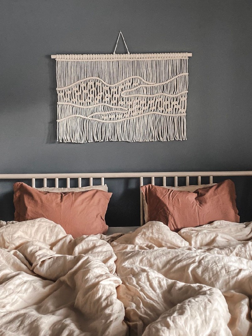 dark grey colour wall with modern macrame piece