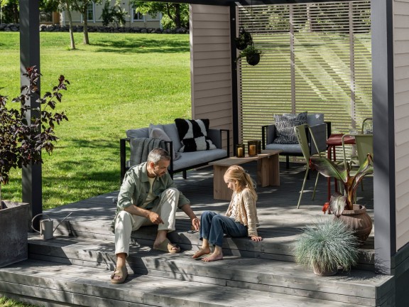 enjoying newly painted wooden decking