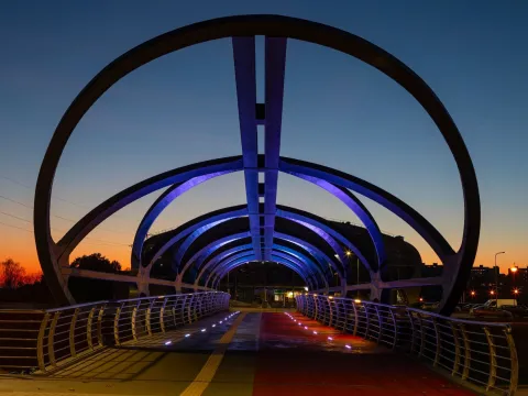 Smart and colourful pedestrian bridge attracts attention with its futuristic form